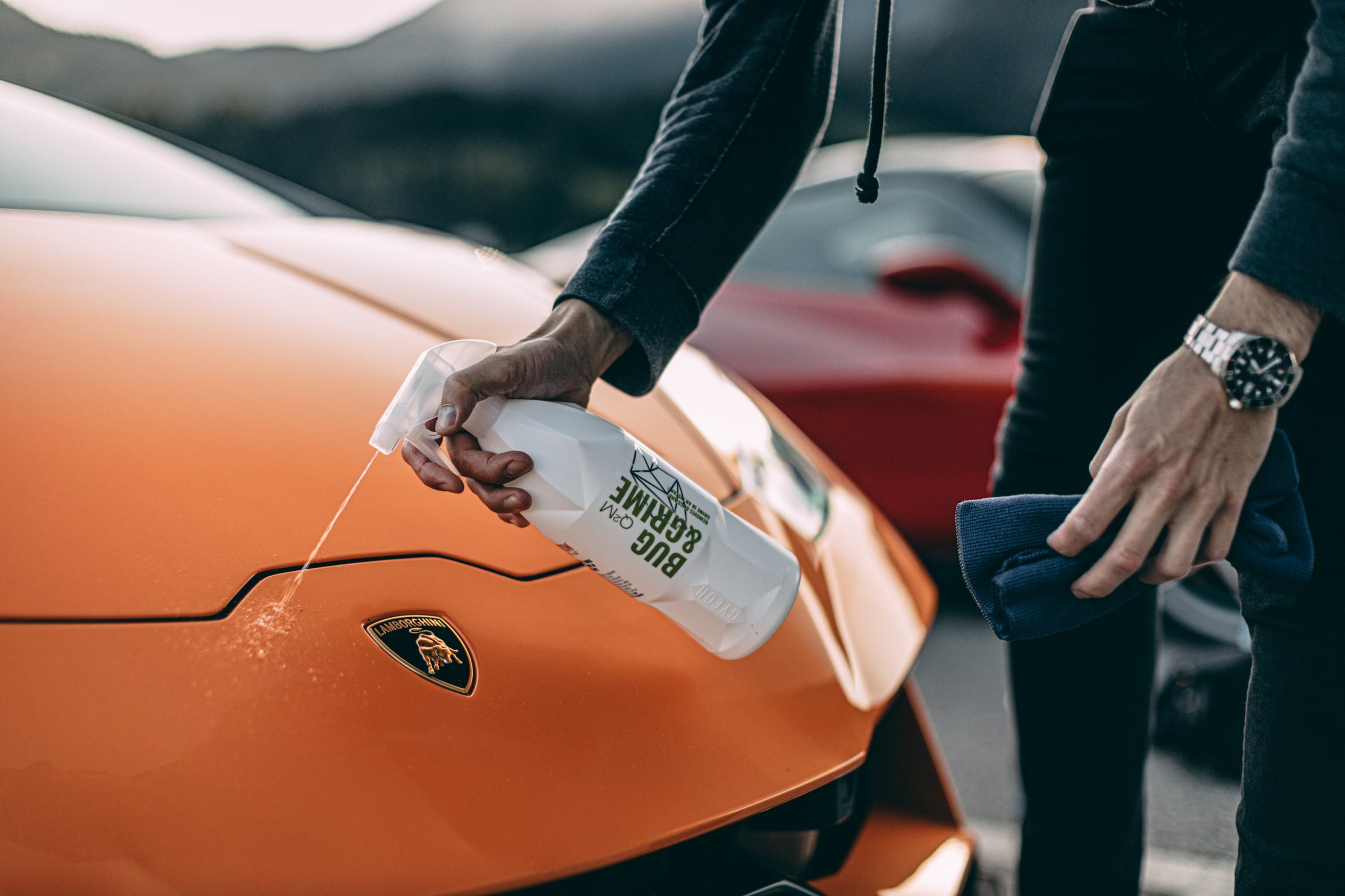 GYEON bug and grime remover sprayed on a lamborghini