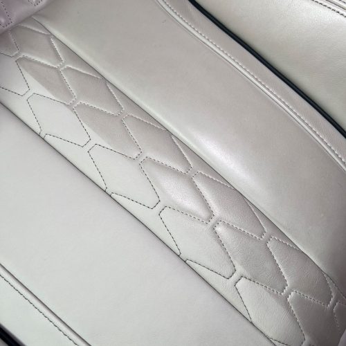 Close up of a leather interior cleaned by sharkey auto detailing perth