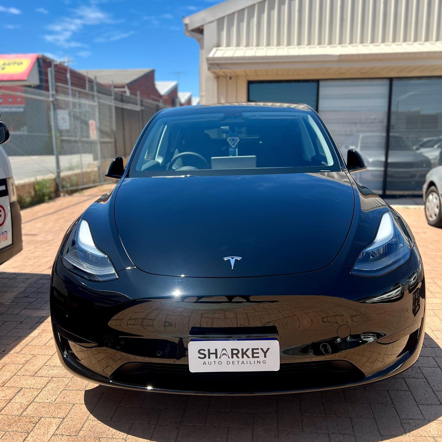 black tesla protection perth front view